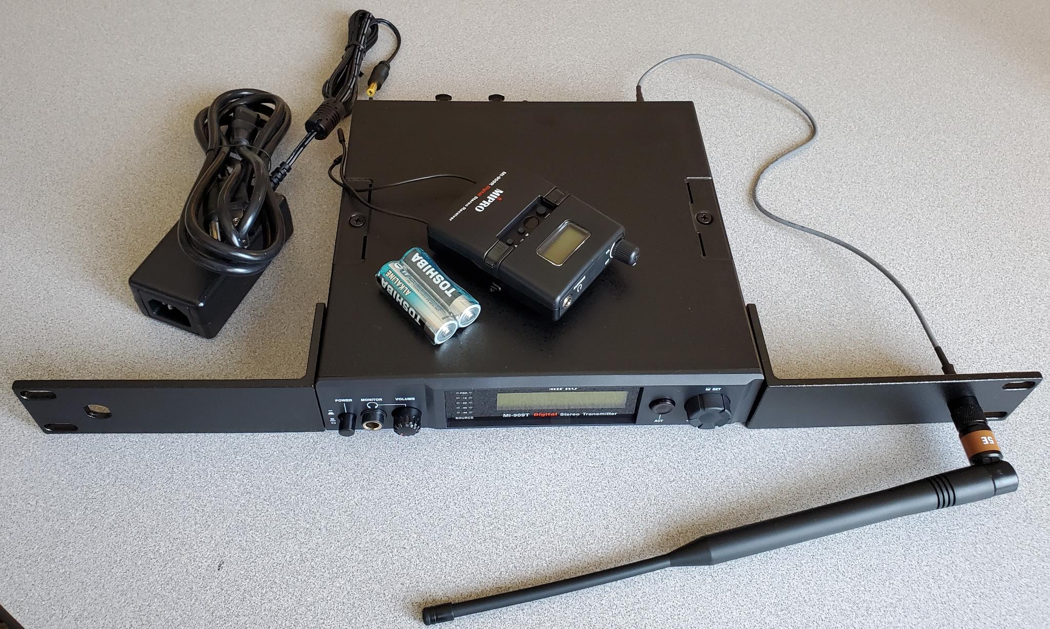 Mipro MI-909 System includes Transmitter, Belt Pack, & Power Supply, Rack Mount Parts and back to front antenna extension Mipro MI909 System. Comes with Transmitter, Belt Pack, Rack Mount Parts, Antenna, Back to Front Antenna Extension, & Power Supply $775